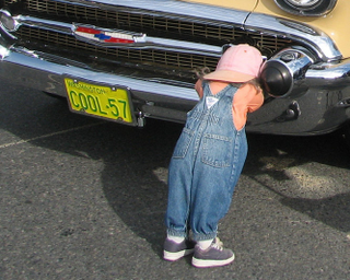 Illustration for article titled Why do car collectors put creepy dolls on their bumpers?